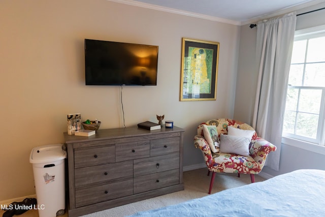 bedroom with light colored carpet, crown molding, and multiple windows