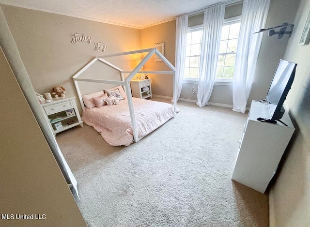 carpeted bedroom with a textured ceiling and ornamental molding