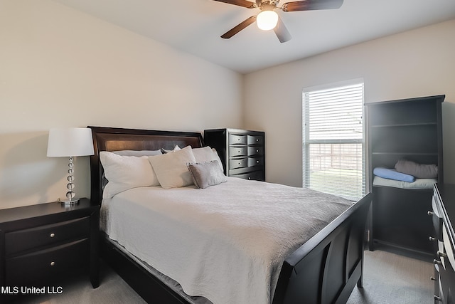 bedroom featuring ceiling fan and carpet floors