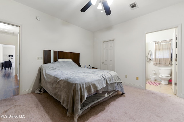 bedroom featuring carpet, visible vents, and baseboards