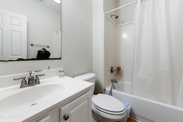 full bathroom with toilet, shower / bath combo, and vanity