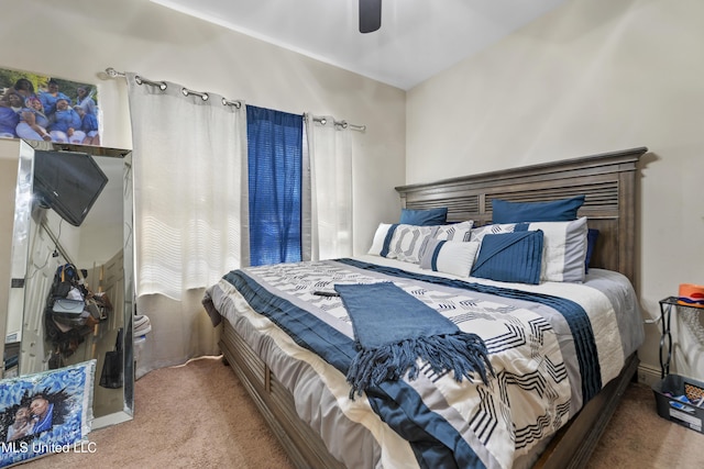 carpeted bedroom featuring ceiling fan