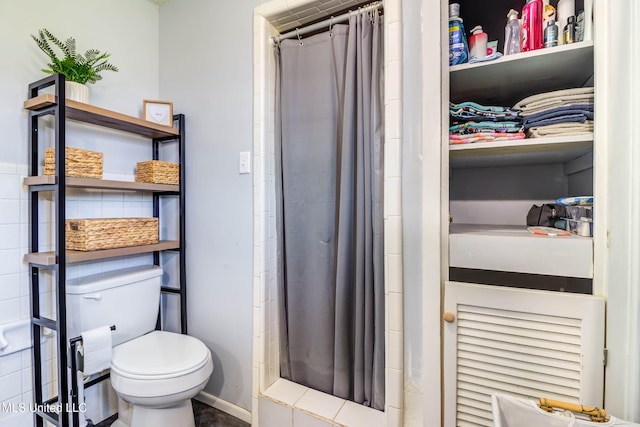 bathroom featuring toilet