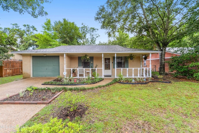 1215 23rd St, Gulfport, MS 39501 - ranch-style home featuring a porch, an attached garage, driveway, and brick siding