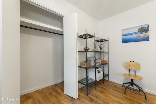 1215 23rd St, Gulfport, MS 39501 - bedroom with wood finished floors and baseboards