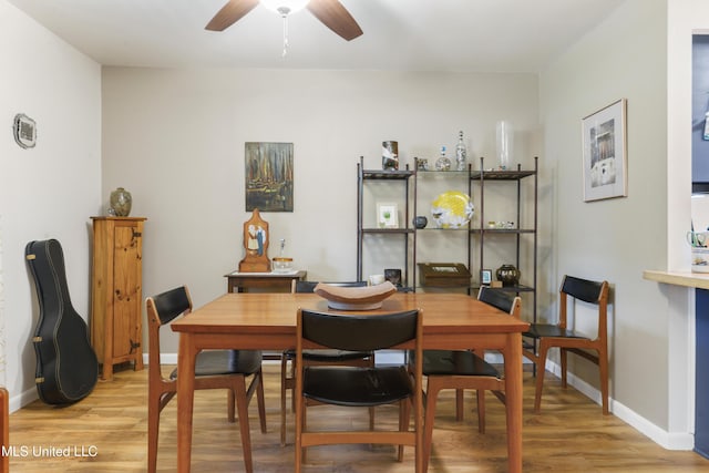 1215 23rd St, Gulfport, MS 39501 - dining area with light wood-type flooring and ceiling fan