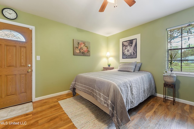 1215 23rd St, Gulfport, MS 39501 - bedroom featuring wood finished floors and a ceiling fan