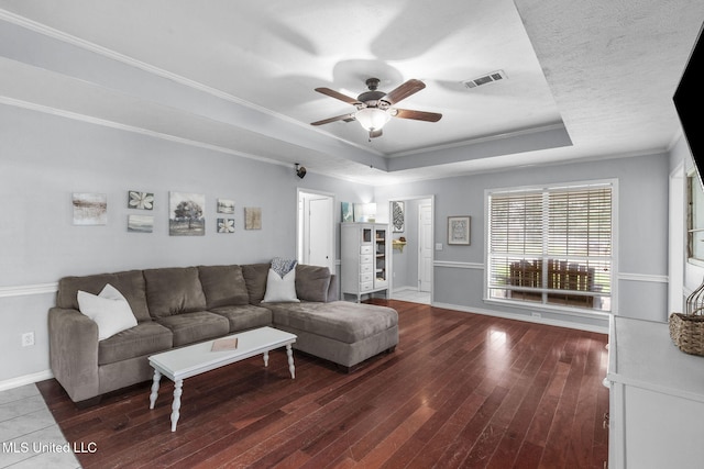 215 Cobblestone Dr, Madison, MS 39110 - living area featuring a tray ceiling, a ceiling fan, wood-type flooring, and ornamental molding