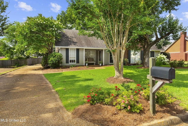 215 Cobblestone Dr, Madison, MS 39110 - obstructed view of property featuring concrete driveway and roof with shingles