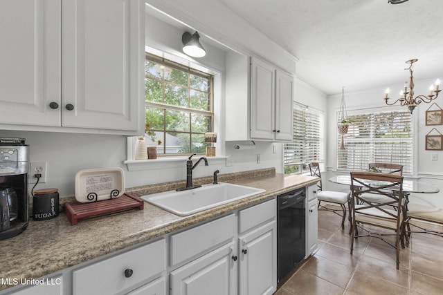 215 Cobblestone Dr, Madison, MS 39110 - kitchen with dishwasher, white cabinets, plenty of natural light, a chandelier, and a textured ceiling