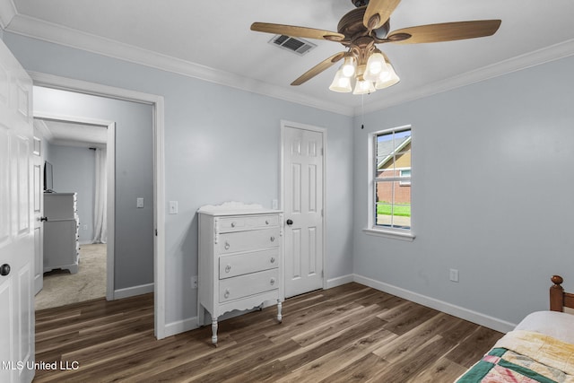 215 Cobblestone Dr, Madison, MS 39110 - bedroom with wood finished floors, crown molding, a closet, and ceiling fan