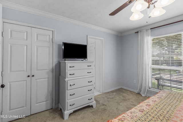215 Cobblestone Dr, Madison, MS 39110 - unfurnished bedroom featuring light carpet, multiple windows, crown molding, a closet, and a ceiling fan