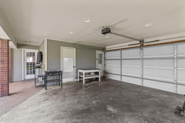 215 Cobblestone Dr, Madison, MS 39110 - garage featuring a garage door opener
