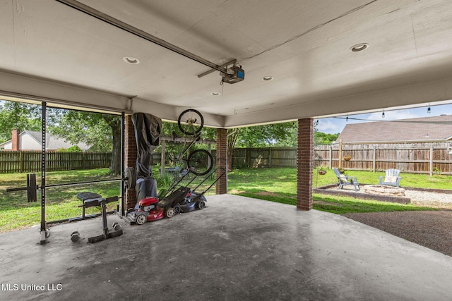 215 Cobblestone Dr, Madison, MS 39110 - fenced backyard featuring a patio and an outdoor fire pit