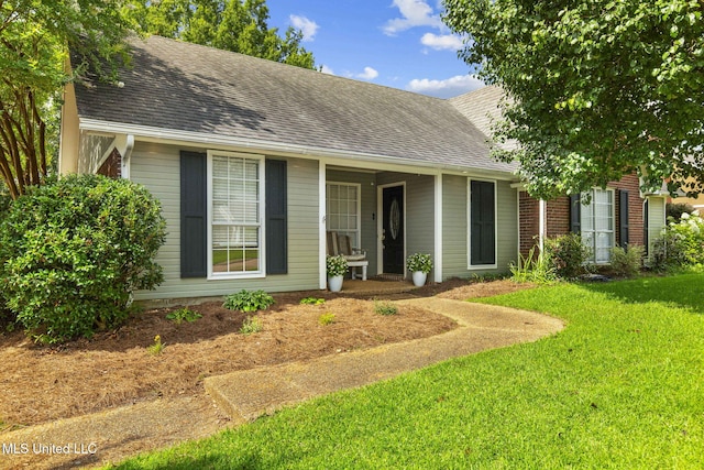 215 Cobblestone Dr, Madison, MS 39110 - ranch-style house with roof with shingles and a front yard