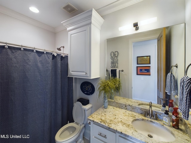 bathroom featuring crown molding, vanity, a shower with shower curtain, and toilet