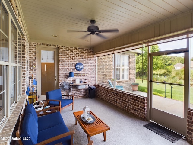 sunroom / solarium with ceiling fan