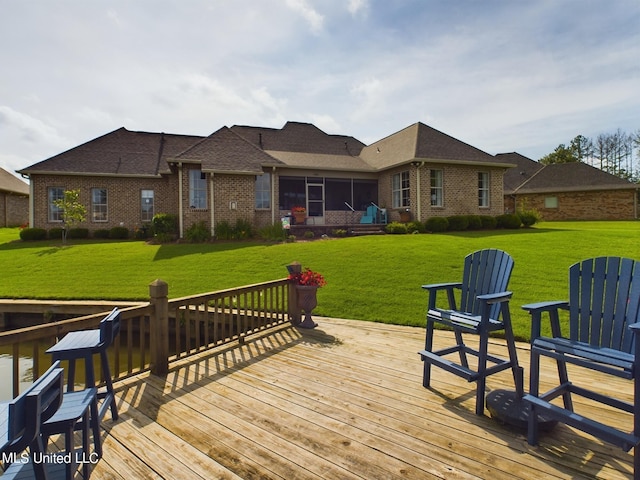 deck featuring a yard