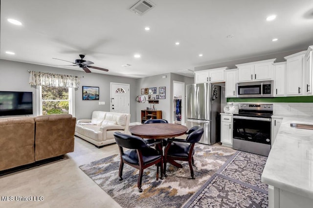 2085 Pat Ln, Biloxi, MS 39531 - dining space featuring ceiling fan and recessed lighting