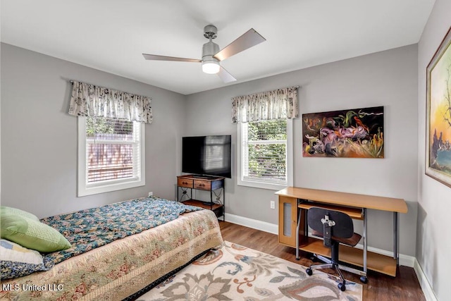 2085 Pat Ln, Biloxi, MS 39531 - bedroom with wood finished floors, baseboards, a ceiling fan, and an office area
