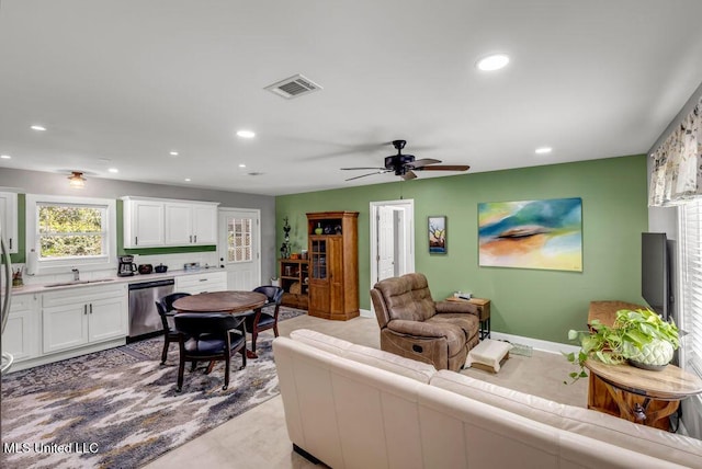 2085 Pat Ln, Biloxi, MS 39531 - living room featuring recessed lighting, ceiling fan, and baseboards