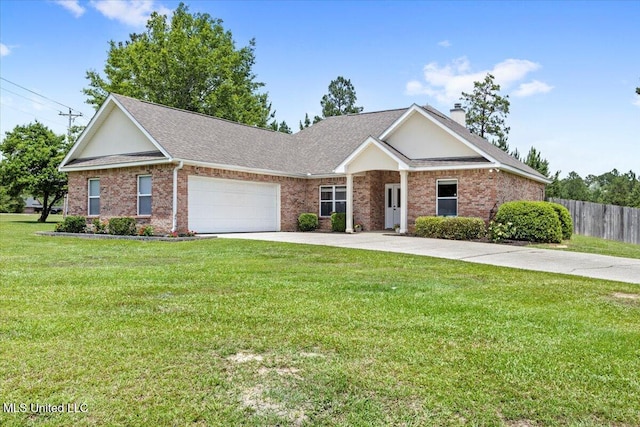 21915 Huntington Forest Dr, Saucier, MS 39574 - view of front of house featuring driveway, a garage, brick siding, a chimney, and roof with shingles