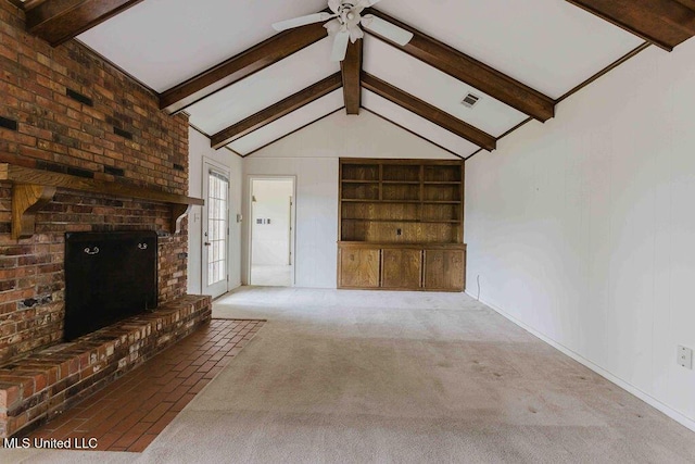 unfurnished living room featuring visible vents, carpet floors, built in features, vaulted ceiling with beams, and a ceiling fan