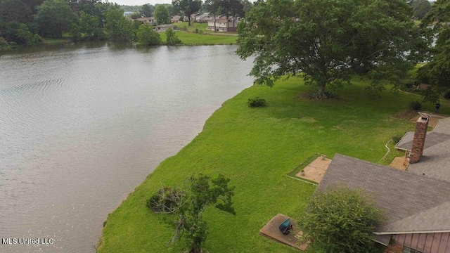 drone / aerial view featuring a water view