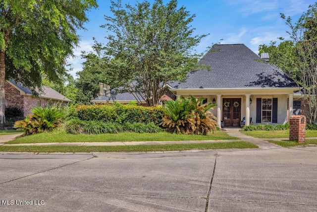 769 Mclane Ln, Biloxi, MS 39532 - view of front of home with french doors and stucco siding