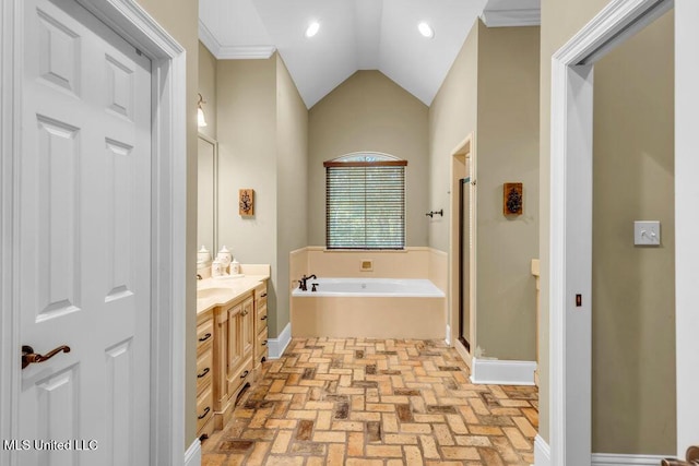 769 Mclane Ln, Biloxi, MS 39532 - full bathroom with vanity, brick patterned floors, a garden tub, a shower stall, and vaulted ceiling