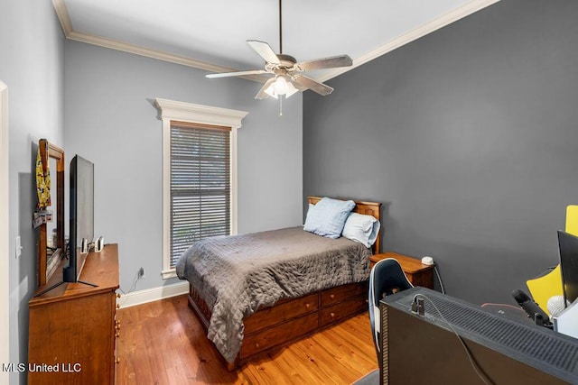 769 Mclane Ln, Biloxi, MS 39532 - bedroom featuring wood finished floors, ornamental molding, a desk, and a ceiling fan