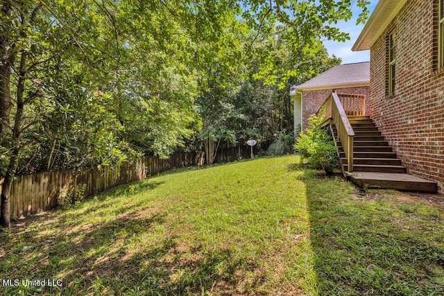 769 Mclane Ln, Biloxi, MS 39532 - fenced backyard with stairway