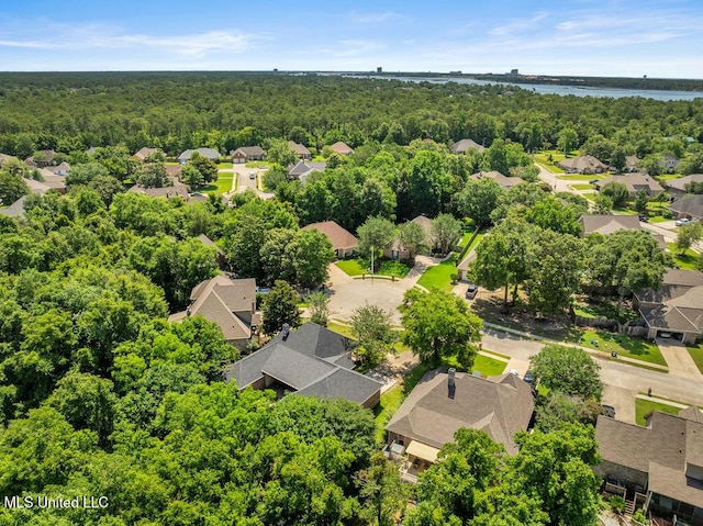 769 Mclane Ln, Biloxi, MS 39532 - aerial perspective of suburban area with a heavily wooded area and a nearby body of water