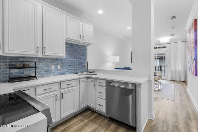 kitchen with stainless steel dishwasher, stove, sink, and white cabinetry