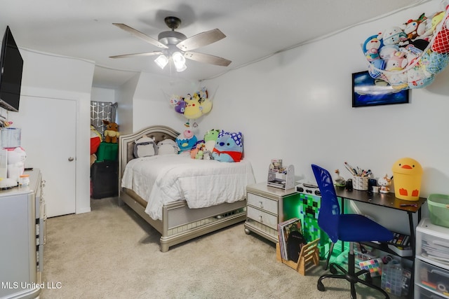 carpeted bedroom with a ceiling fan