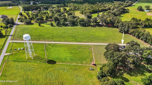 birds eye view of property featuring a rural view