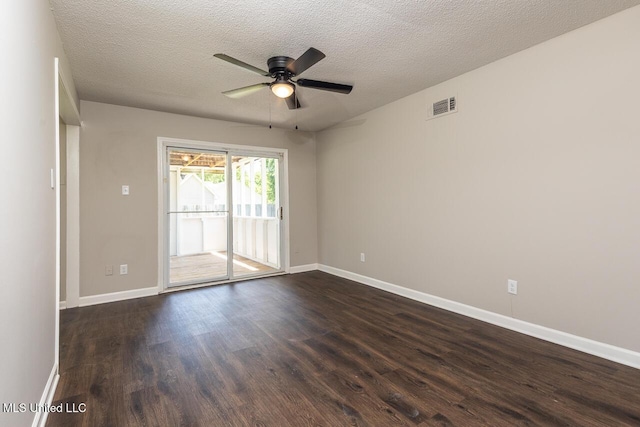 6236 Tulane Rd, Horn Lake, MS 38637 - spare room with ceiling fan, dark wood-style flooring, baseboards, and a textured ceiling