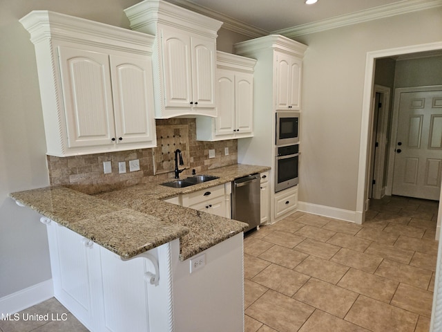 119 Hemlock Ln, Madison, MS 39110 - kitchen with stainless steel appliances, light stone counters, tasteful backsplash, a breakfast bar, and ornamental molding