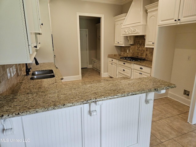119 Hemlock Ln, Madison, MS 39110 - kitchen with premium range hood, light stone countertops, a breakfast bar, backsplash, and crown molding