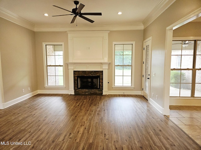 119 Hemlock Ln, Madison, MS 39110 - unfurnished living room with ceiling fan, a high end fireplace, dark wood finished floors, ornamental molding, and recessed lighting