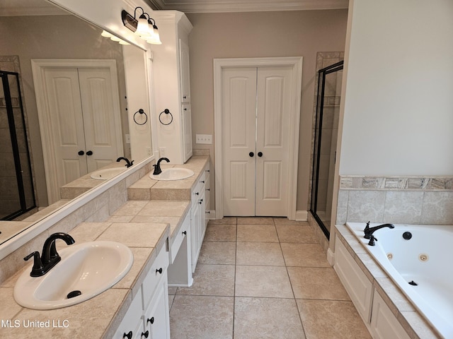 119 Hemlock Ln, Madison, MS 39110 - bathroom featuring double vanity, a shower stall, a tub with jets, ornamental molding, and tile patterned flooring