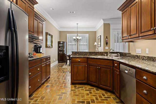 3 Rue Orleans Ct, Long Beach, MS 39560 - kitchen with appliances with stainless steel finishes, a breakfast bar, crown molding, baseboards, and stone counters