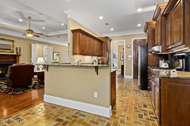 3 Rue Orleans Ct, Long Beach, MS 39560 - dining area with a chandelier, crown molding, dark wood-style flooring, and baseboards