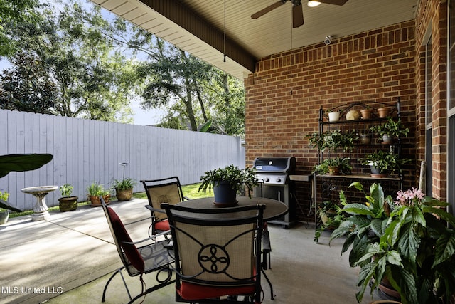 3 Rue Orleans Ct, Long Beach, MS 39560 - view of patio / terrace with grilling area, outdoor dining space, and a ceiling fan