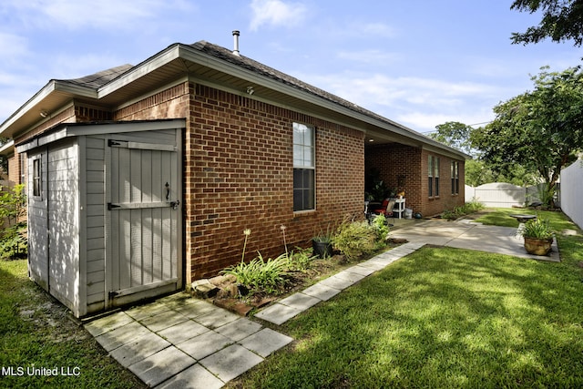 3 Rue Orleans Ct, Long Beach, MS 39560 - rear view of house featuring brick siding and a patio