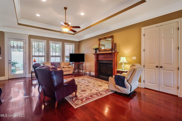 3 Rue Orleans Ct, Long Beach, MS 39560 - living area with a raised ceiling, wood finished floors, plenty of natural light, ornamental molding, and recessed lighting