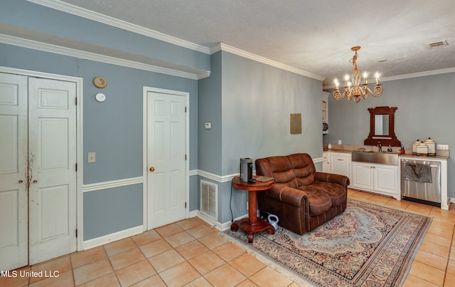 tiled living room with a notable chandelier, a textured ceiling, sink, and crown molding