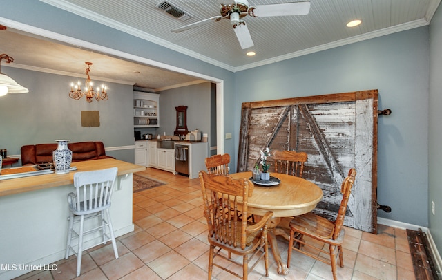 tiled dining space featuring ornamental molding and ceiling fan with notable chandelier