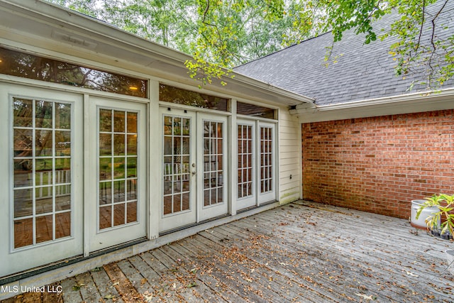 wooden terrace featuring french doors