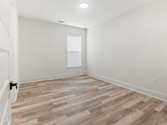 empty room featuring light hardwood / wood-style floors